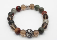 Bracciale elastico con diaspro quarzo fumè ed elementi in Argento 925