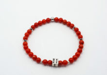 Bracciale bambini corallo e dado in argento