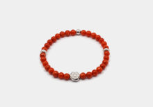 Bracciale bambina corallo e fiorellino in argento
