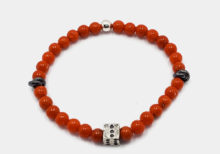 Bracciale bambino corallo e dado in argento